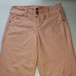 peach colored tight pants